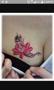 Pin By Tamika Monique On Tattoos With Images Chest Tattoos For Women Tattoo Designs For Girls Small Lotus Tattoo