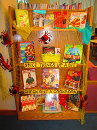 Cooking Library Display Encouraging Patrons To Spice Up There Usual Book Selection With A Cook Book Cookbook Display Library Book Displays Book Display