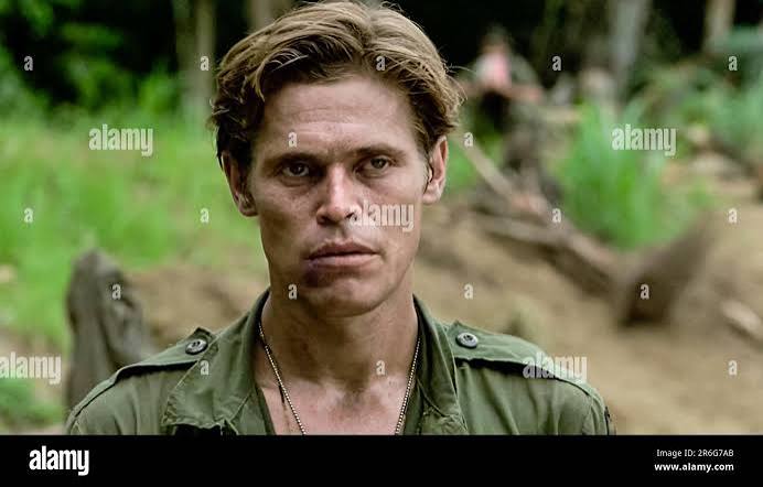 USA. Willem Dafoe in the (C)Orion Pictures movie: Platoon (1986). Plot:  Chris Taylor, a neophyte recruit in Vietnam, finds himself caught in a  battle of wills between two sergeants, one good and