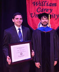 Talal Younes Left With Dr Tyler Hodges Of William Carey University Right Who Presented Talal With The Senior Biol Homeschool High School Homeschool Carey