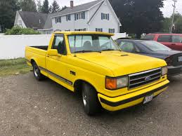 Image result for Bright Yellow 1990 Truck