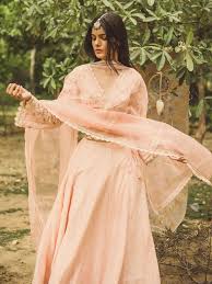 The light blue or red dress is sold on revolve, made by superdown and sold for just $68. Summer Brides These Lightweight Indian Wear Collections Are A Trousseau Must Have Vogue India Fashion