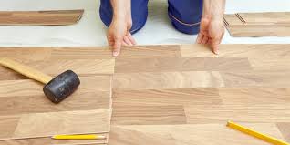The base is fiberboard, with a photographic image layer bonded over the top. The Best Flooring To Use In Your Florida Remodel Hardwood Vs Tile Vs Lvp