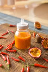 Spice Up Your Summer With These Fruit Based Hot Sauce Recipes Chowhound Hot Sauce Recipes Fruit Salsa Recipe Sauce