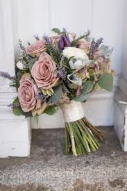 Find sage green flowers at fiftyflowers! Love The Muted Vintage Tones Of Rose Lavender And Sage Green In This Beautiful Bridal Bouque Dusty Rose Wedding Colors Vintage Bridal Bouquet Wedding Bouquets