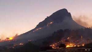 City of cape town traffic services spokesperson maxine bezuidenhout said road closures remain in place on monday morning. Wildfires Rage On Cape Town S Lion S Head Mountain In Pictures The National