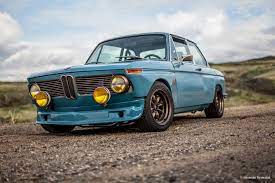 A Day Spent Carving Corners In A Tweaked Bmw 2002 Petrolicious Bmwclassiccars Bmw 2002 Bmw Classic Cars Classic Cars