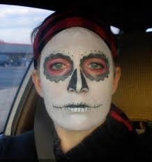 I was sitting in the park when this strange figure suddenly appeared,  dressed all in black with a black hood covering his face and a large scythe  over one shoulder. I said "