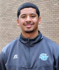 Jamaal Martin led the 2014 graduating class as the Chief Student Marshal