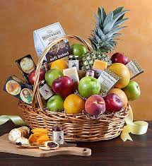 Surprise your favorite foodie with these. Deluxe Fruit Gourmet Basket 1800flowers Com 148645