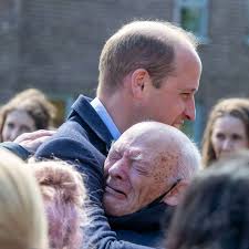 Prince William ignores royal rulebook as he hugs tearful pensioner in  touching moment