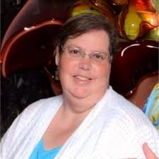 Today my little coworker was able to join me under the radar during a  meeting for a short time during feeding time and I was still able to listen  and participate. |