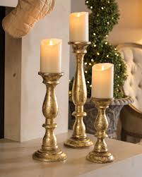 Discover gold candle holder at world market, and thousands more unique finds from around the world. Golden Wood Pillar Candle Holders Balsam Hill Candle Holders Wall Decor Candle Wall Decor Wall Candle Holders