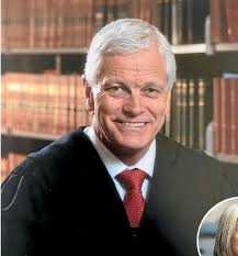 Inquest into judge's suicide shows mounting pressures in the judiciary