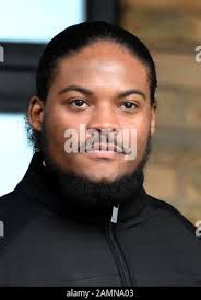 Marlon Wright leaves Kingston Crown Court, south west London, where he is 