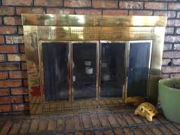 Remove all brick that extends beyond the plane of the surrounding wall including the hearth. Fireplace Surround Removal