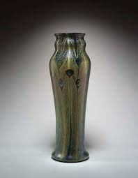 Check spelling or type a new query. A Decorated Favrile Glass Peacock Vase