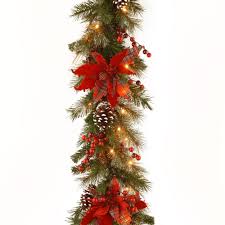 Use our garland to brighten your doorway and welcome guests during the holidays! Poinsettia Artificial Christmas Garland At Lowes Com
