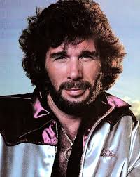 Seven lonely days and a dozen towns ago, I reached out one night and you  were gone Don't know why you would run, what you're running to or from, all  I know