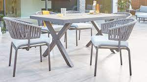 When warmer weather arrives, so do lovely days when you can eat outside. Rio Grey 6 Seater Outdoor Dining Table And Ivy Chair Set Outdoor Dining Table Outdoor Dining Chairs Dining Sets Uk