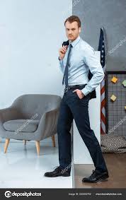 Search results for holding over the shoulder posing stock photos and images. Handsome Businessman Jacket Shoulder Posing Armchair Usa Flag Office Free Stock Photo C Andrewlozovyi 223033722