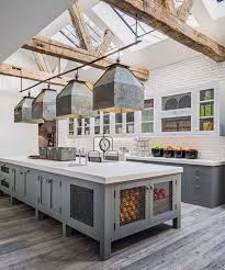 Large Farmhouse Kitchen With Gray Cabinets And Modern Industrial Pendant Lights Fa Rustic Farmhouse Kitchen Modern Farmhouse Kitchens Farmhouse Style Kitchen