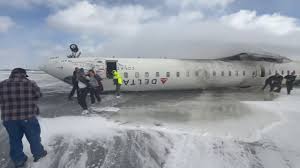 Plane crashes and flips at Toronto airport, leaving 18 injured