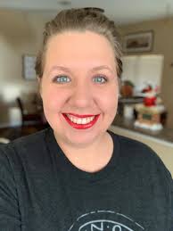 Maggie's orange outfit