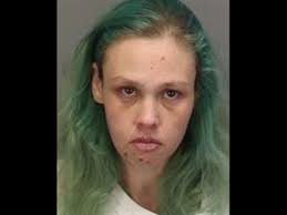 Mother charged with murder of baby found in trash