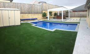 In this video i'll show you all the steps required to install artificial turf in your yard, from filling and grading, to compacting, cutting, and seaming. Artificial Grass Around Swimming Pool Wa Turf Gurus Synthetic Grass Perth