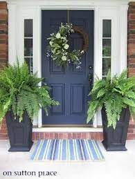 Front door colors vary depending on the style of house, color of the exterior and area of the country where you live. What Color Door Looks Good With Black Shutters On Brick House Google Search Painted Front Doors Front Porch Decorating Front Door Decal