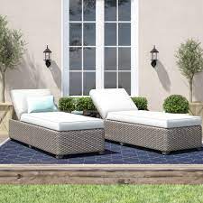 A pair of cupholders are perfect for cold drinks on warm days. The Best Outdoor Chaise Lounges Popsugar Home