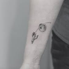 Small tattoos for guys on the lower side of the chest, one inch from mamma and on the left side a drawing that shows a simple representation of an elephant. The Big Breakdown Of Small Tattoos