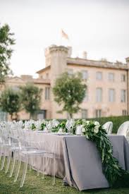 This La Couple Planned Their Dream Wedding In Provence Ghost Chairs Wedding Reception Wedding Reception Chairs French Chateau Weddings