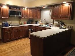 Come in to see our showroom with a wide variety of styles and options to choose from or see our warehouse full. Silver Cloud Granite With Cabinets And Tile Affordable Granite Cabinetry Outlet