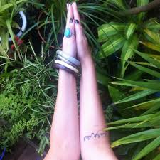 Choose your favorite name design from this list. Forearm Tattoo Saying Less Is Beauty In Arabic On