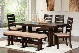 The table is a walnut veneer construction and the chairs are solid walnut frames. 26 Dining Room Sets Big And Small With Bench Seating 2021 Home Stratosphere