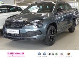 Hello and welcome to lans mobility!in today's video, we'll take an up close and in depth look at the 2021 skoda kodiaq sportline business this one has the co. Skoda Karoq Sportline Quarzgrau Metallic Skoda Karoq Review