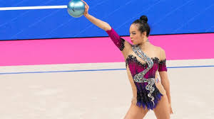 An olympic medal event since 1984, rhythmic gymnastics sees athletes perform contortions and manoeuvres to music while using hoops, balls, clubs or ribbons. Laura Zeng Leads First Full U S Olympic Rhythmic Gymnastics Team Olympictalk Nbc Sports