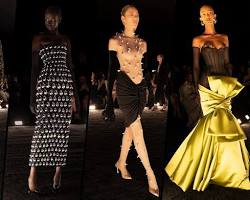 صورة American artist 3D flower dresses metal chains feathers avantgarde fashion