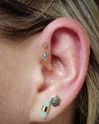 Ryan Feagin On Instagram Beautiful Double Forward Helix Combo From Today 18k Yellow Gold With A Genui Forward Helix Earrings Cute Ear Piercings Big Earrings