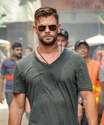 You get plenty of good views of the army green rangeman throughout the movie: Chris Hemsworth Stars In Violent Extraction Trailer