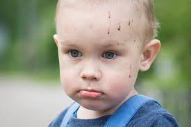 Eugene`s Face after a Fun in a Puddle Stock Image