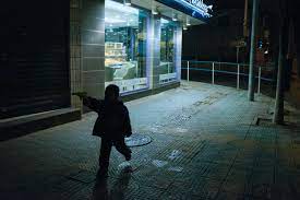 Amateur beautiful young couple decide to make a show in front of the window. Meet The Amateur Street Photographer Taking China By Storm Time