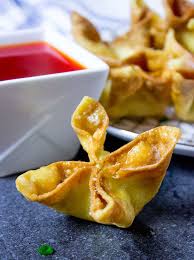 Cream Cheese Wontons Served With Sweet And Sour Sauce Food Recipes Wonton Recipes