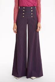 Super flare jeans in any wash with a sassy af faux fur jacket for a nighttime concert or festival look. Bell Bottom Trousers Home Facebook