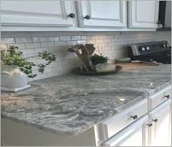 Fantasy Brown Leathered Granite Glass Subway Tile In Taupe Against Fantasy Brown Cheap Kitchen Countertops Kitchen Remodel Countertops White Kitchen Backsplash