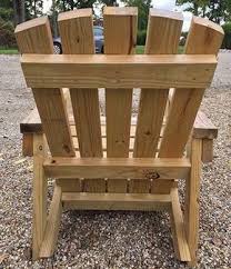 2x4 Diy Adirondack Chair Perfect For The Patio Backyard Or Fire Pit Adirondack Chairs Diy Diy Chair Pallet Furniture Outdoor