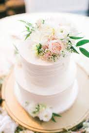Wedding Cake With Floral Cake Topper The Bridge Building Floral Cake Topper Floral Cake Wedding Desserts