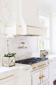 7 Tips For Decorating With White Stainless Steel Appliances Hunker Silestone Countertops Interior Kitchen Marble